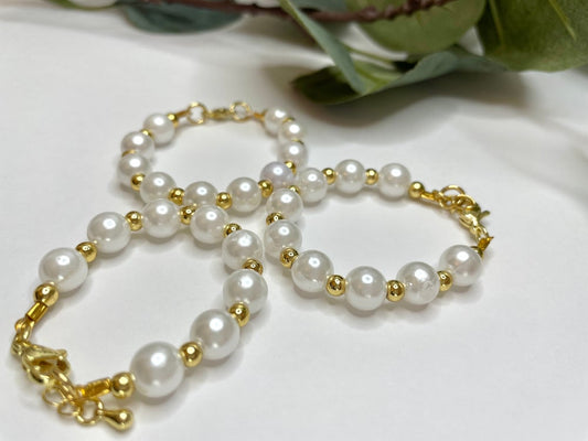 Perla con oro